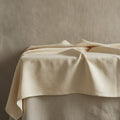 Olive Grove Tablecloth, Warm Cream Linen-Look Cotton Tablecloth — styled 1