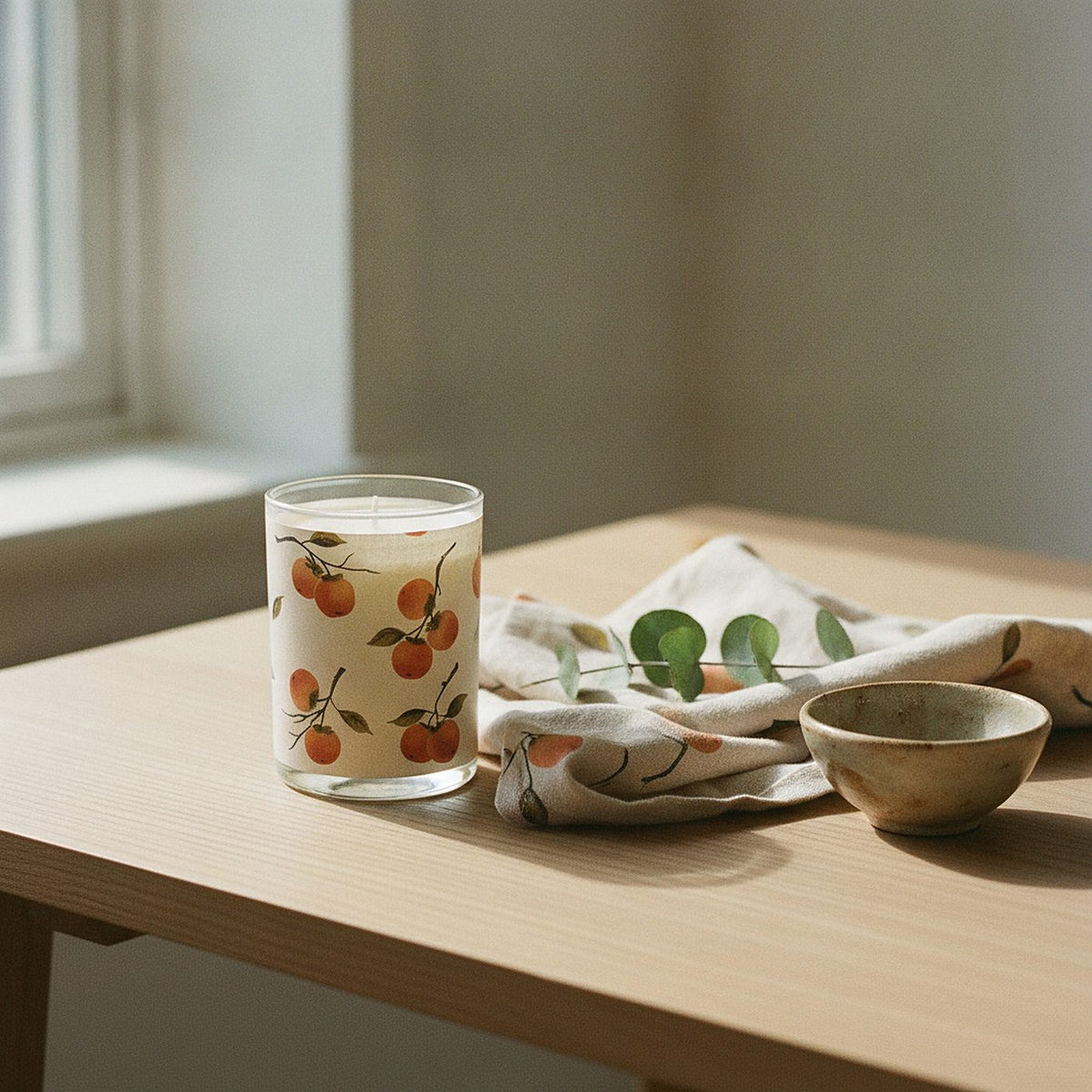 Persimmon Scented Candle — styled, 2