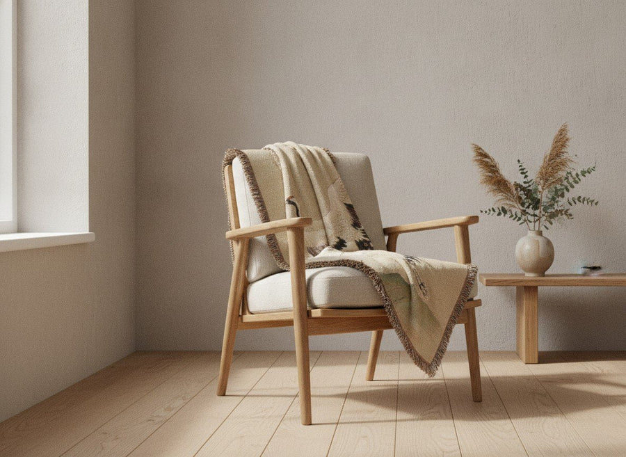 Crane woven throw over an oak armchair